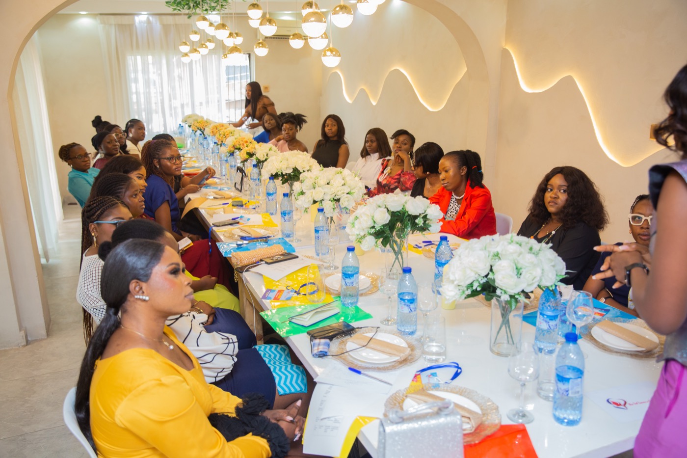 Women in conversation at a past hangout